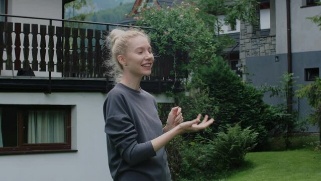 Woman holding keys of the new house.