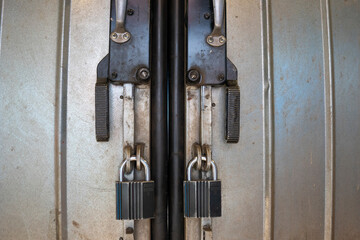 Two locks hang on the door