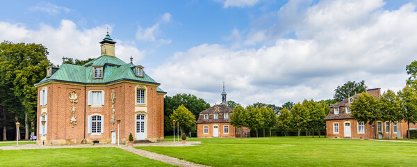 Panorama with main building and chapel of castle Clemenswerth in Sogel Lower Saxony in Germany