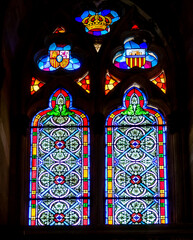 Colorful stained glass window in the Santa Ana chapel of the Royal Palace of Almudaina in Palma de...