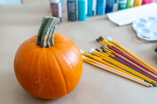 Seasonal Fall Orange Pumpkin Painting and Brushes