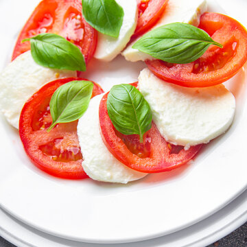 Caprese Salad Mozzarella And Basil Tomato Fresh Meal Food Snack On The Table Copy Space Food Background