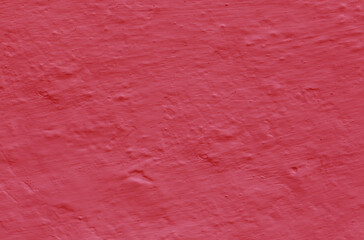 Abstract panoramic image of a red clay wall.