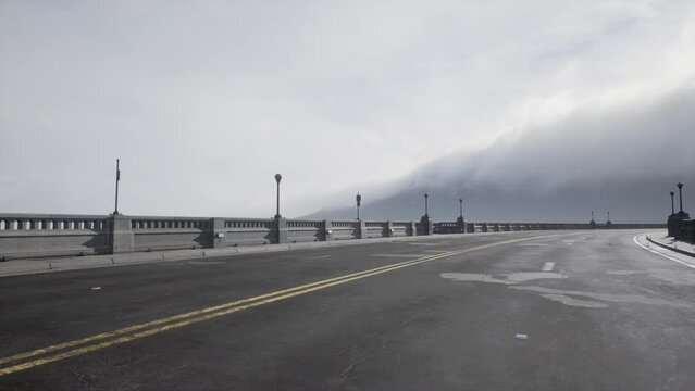 Old empty stone bridge on a foggy day