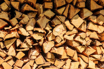 Background of the stacked dry chopped firewood