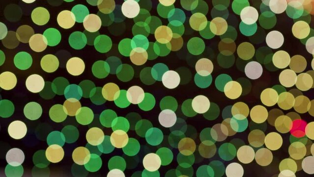 Bright yellow and green flashing circles. Stock footage.Light cartoon animation with alternating flashing light from circles.