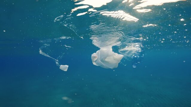 Plastic objects float in the sea