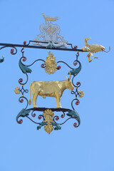 Historic restaurant sign, golden bull, isolated