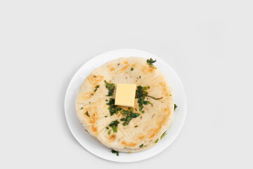 Masala Kulcha Or Kulche Is Fluffy Mildly Leavened Flatbread Made Of Knead Dough Of Maida Flour Yeast Mixed With Milk And Butter With Fresh Green Coriander Leaves And Cheese Butter Topping