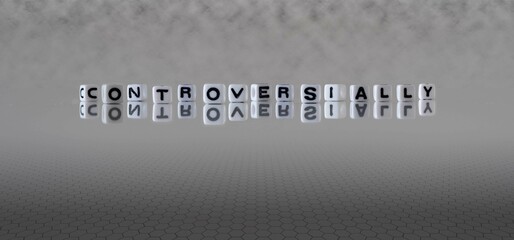 controversially word or concept represented by black and white letter cubes on a grey horizon...