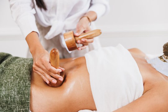 Maderotherapy Massage With Wooden Cup In A Spa Centre