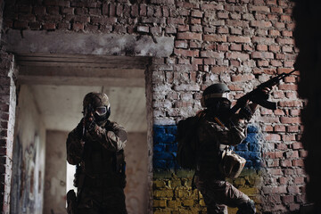 Ukrainian soldiers on the battlefield. Special forces are conducting a combat operation.