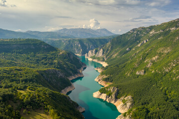 Aerial view of Beautiful Piva river canyon with reservoir Piva Lake (Pivsko Jezero) summer view in...