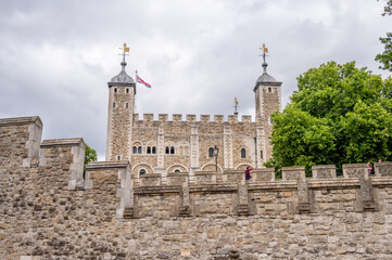 Fototapeta na wymiar London, UK - August 21, 2022: Walls and central tower of the Tower of London.