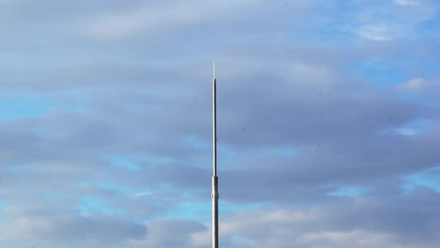 Time-lapse. cellular tower. sky with moving clouds. footage beautiful sky.