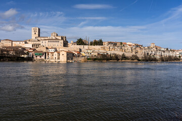 Zamora Romanesque cathedral and bell towers since Duero river. Spain