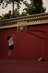 child playing basketball