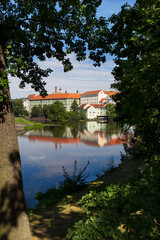 Obraz premium Sunny royal medieval Town Pisek above the River Otava, Czech Republic 