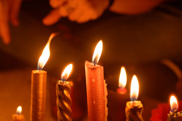 burning candles in the church or night of christmas