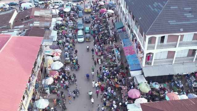 Drone shot of  Busy street, heavy traffic,Local market shopping  area,Africa congestion and  busy road in Africa
