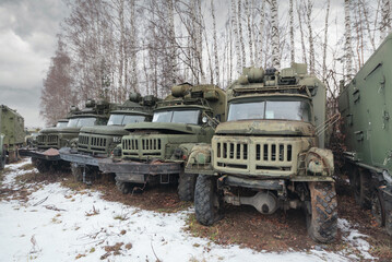 Broken and abandoned Russian military trucks in the snow