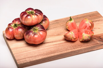 Few Green tiger tomato is wet.