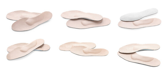 Set with orthopedic insoles on white background