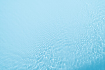 Fototapeta na wymiar surface of water, blue wave background