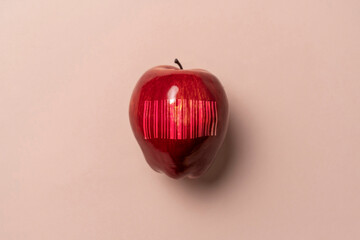 fresh new ripe fruit with a barcode on pastel background