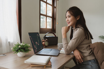 Business woman trading and analysis on laptop. Planning and strategy on Stock market