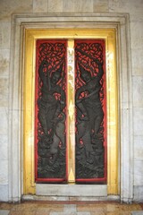 Thai art door of ordination hall in Wat Benchamabophit Dusitwanaram, It is one of Bangkok's best-known temples and a major tourist attraction.