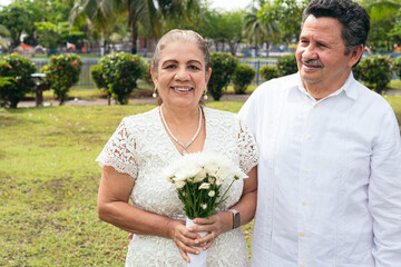 Portrait of smiling Latin husbands outdoors