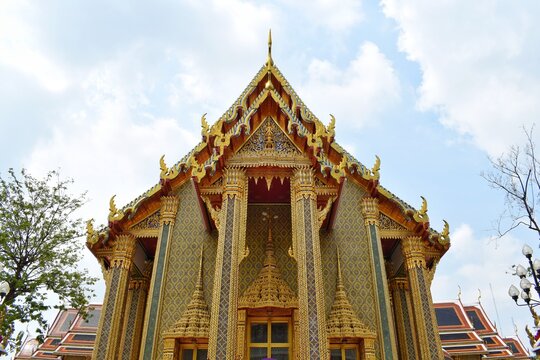 The entrance doors of Wat Ratchabophit are 3m high and are decorated with inlaid mother-of-pearl. This is a Buddhist temple on Atsadang Road in Bangkok.