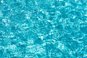 Water in swimming pool, background with high resolution. Wave abstract or rippled water texture.