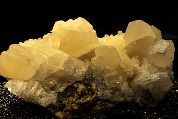 A detailed closeup of a beautiful cluster of glassy quartz crystal mineral stones.