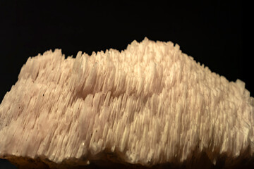 A detailed closeup of a beautiful cluster of glassy quartz crystal mineral stones.