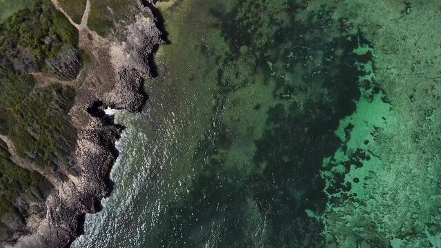 Spectacular Kenyan coastal at Watamu, rocky cliffs and seaside landscape of Africa - aerial look down