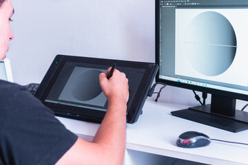High quality photography. Draftsman making a gradient in design software. Graphic designer working on his computer.