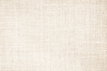 Fototapeta na wymiar Jute hessian sackcloth burlap woven, linen texture pattern background in light beige cream brown color.