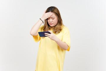 Using Smartphone of Beautiful Asian Woman wearing yellow T-Shirt Isolated On White Background