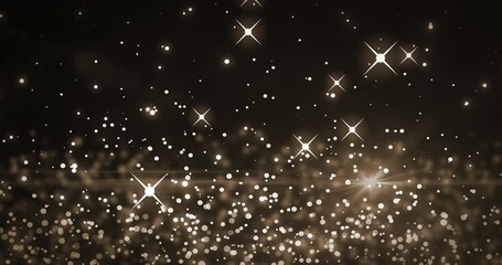 Animation of multiple glowing white spots of light moving in hypnotic motion on black background