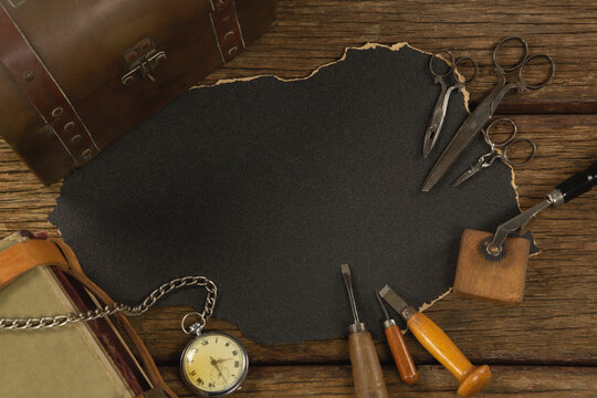 Paper piece with tools on table