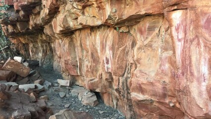 Australian Aboriginal mythology painted on rock gallery in Kimberley Western Australia.