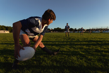 Rugby player preparing to pass the rugby ball