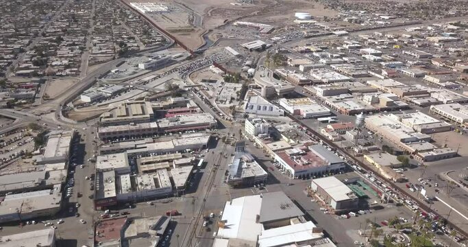 Drone flying to the left over Mexico showing the border of the United States of America