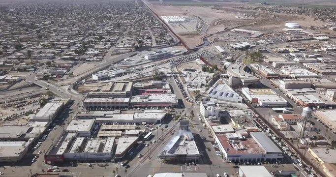 Drone flying over Mexico aside the border of the United States of America