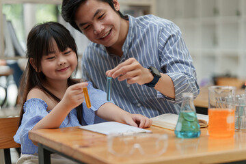 Kid and teacher doing science experiments. back to school concept