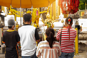 Chiangmai, Thailand , september , 2022;: Alms Offering Ceremony on the Buddhist Lent Day of Buddhists in Thailand making merit with flowers ;Thai Buddhist to do good things make merit by offer..