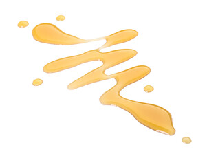 Spilled maple syrup on white background