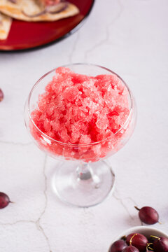 Refreshing summer frozen wine sushy in glasses on the table. Summer drinks. Vertical view. Closeup
